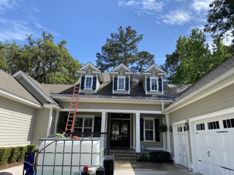 Expert window cleaning services in Beaufort. Ladder leading to the roof of a home